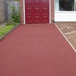 Nottingham concrete driveway resurfaced in pigmented red resin