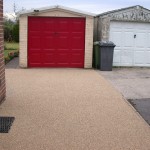 Concrete driveway resurfaced with resin bonded stone
